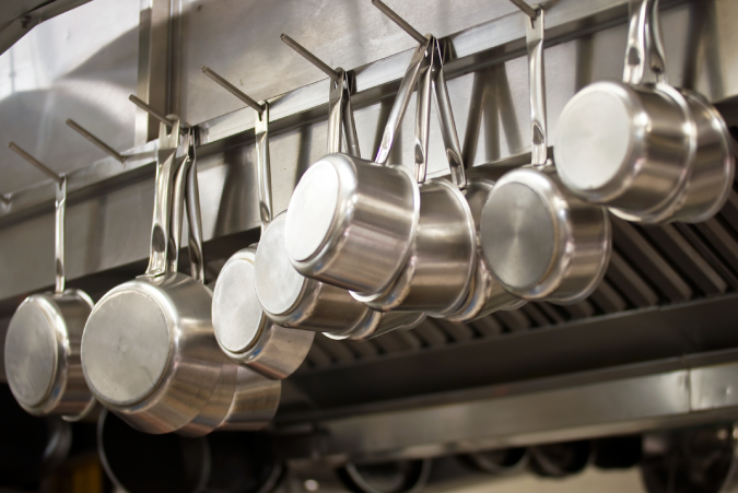 Hanging the utensils and setting up the signs Hanging the utensils and setting up the signs